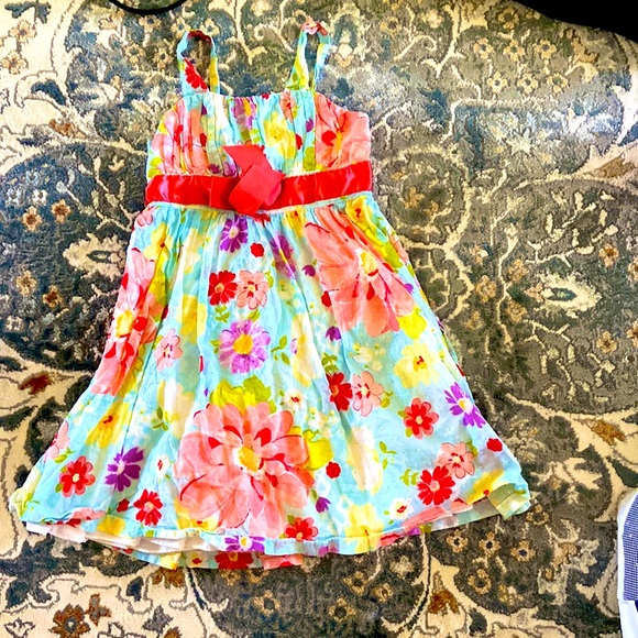 Floral dress with vibrant colors and a bow in the back - Picture 1 of 1